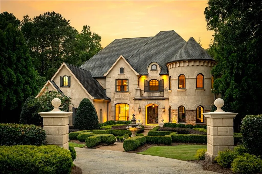 French country inspired facade featuring a balcony