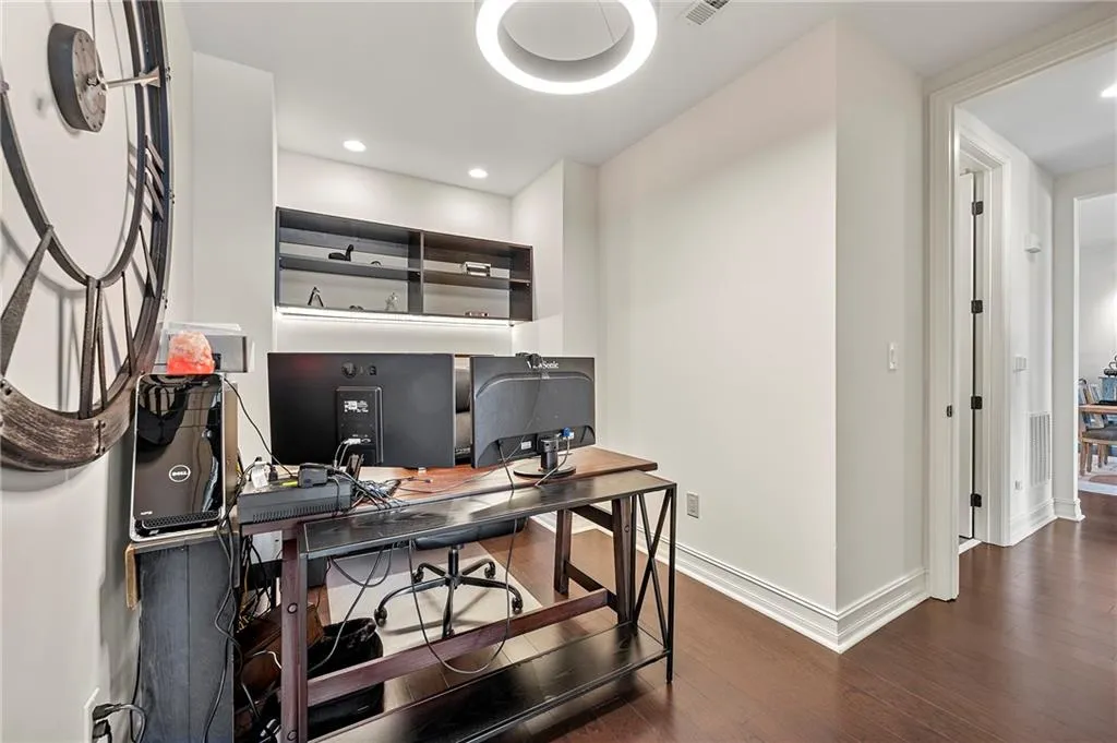 Office/Den featuring recessed lighting, visible vents, baseboards, and dark wood finished floors