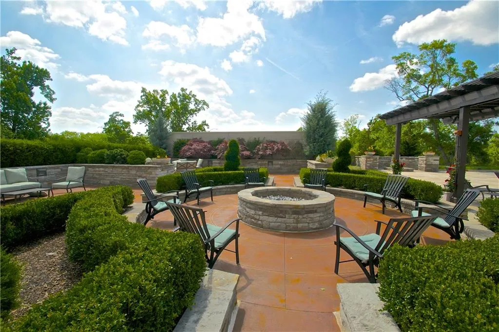 View of patio featuring a fire pit