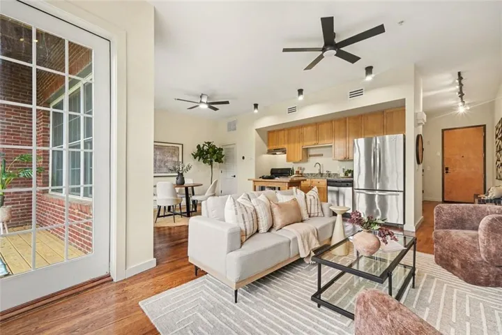 Soaring Ceilings, Hardwood Floors, And A Wide-Open Layout With Plenty Of Room To Entertain