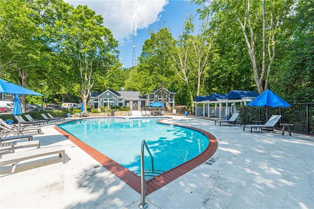 View of pool with a patio area