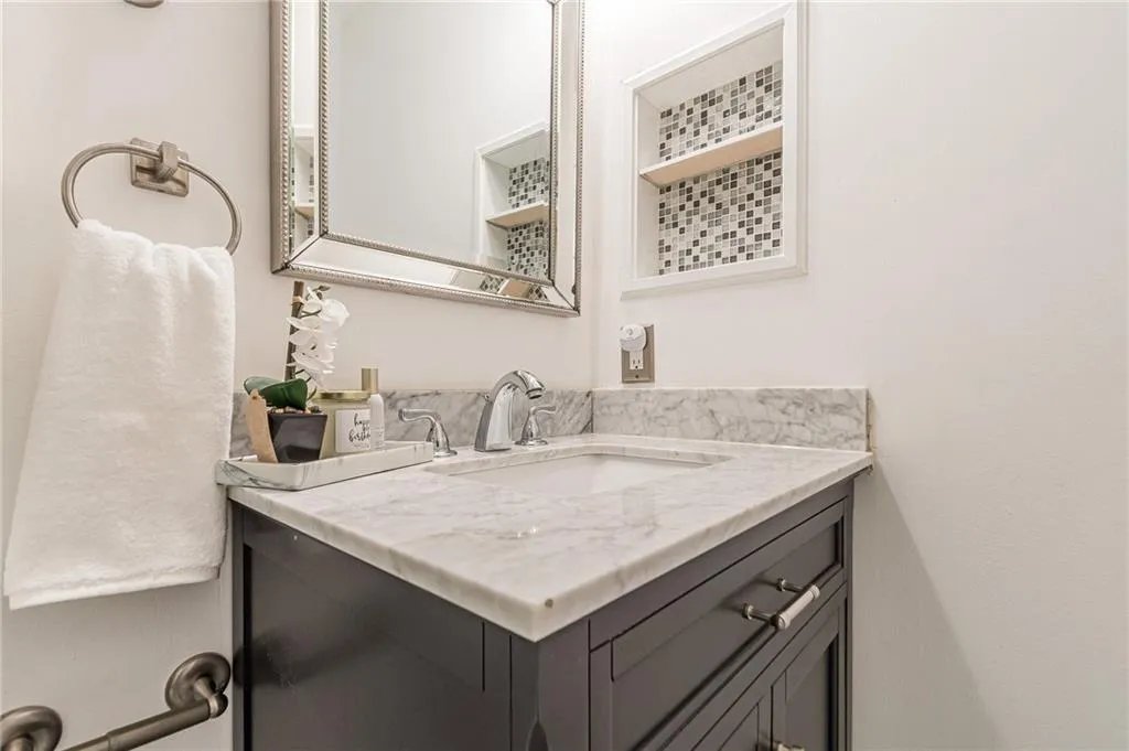 Bathroom featuring updated vanity