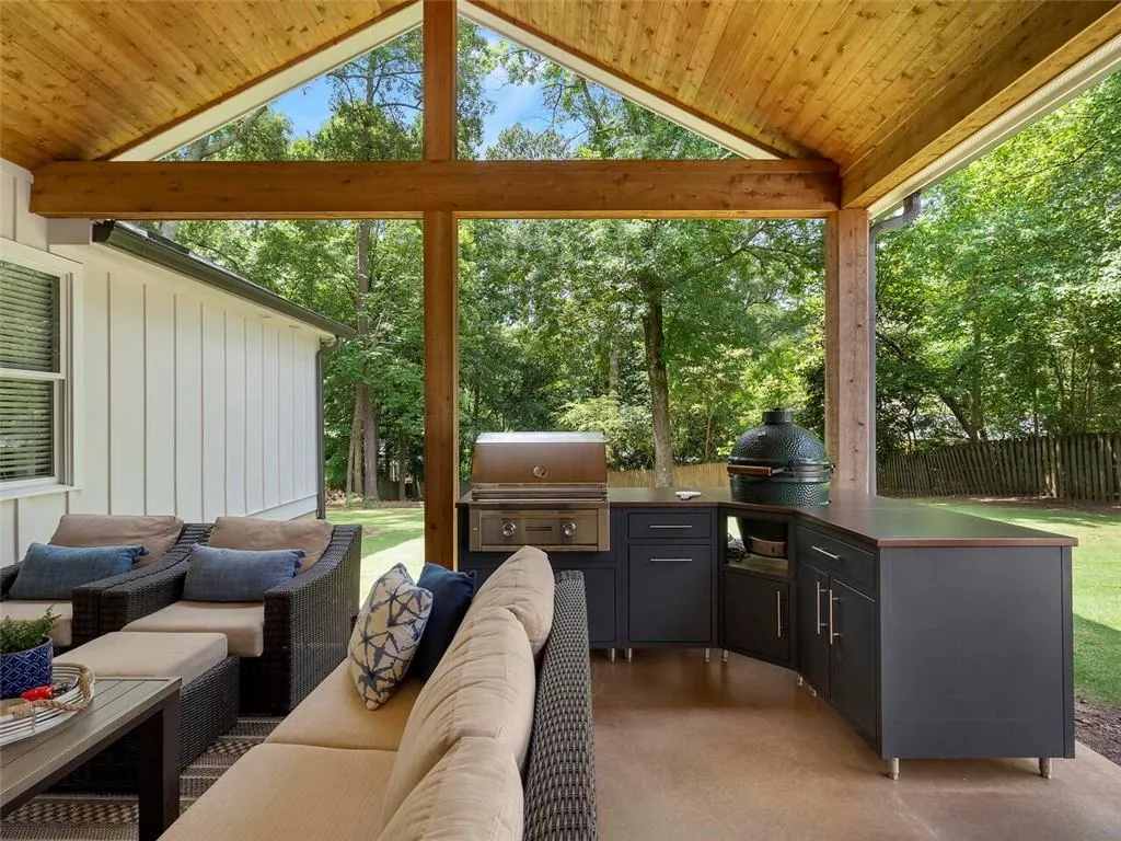 View of patio / terrace featuring an outdoor kitchen, an outdoor living space, and area for grilling
