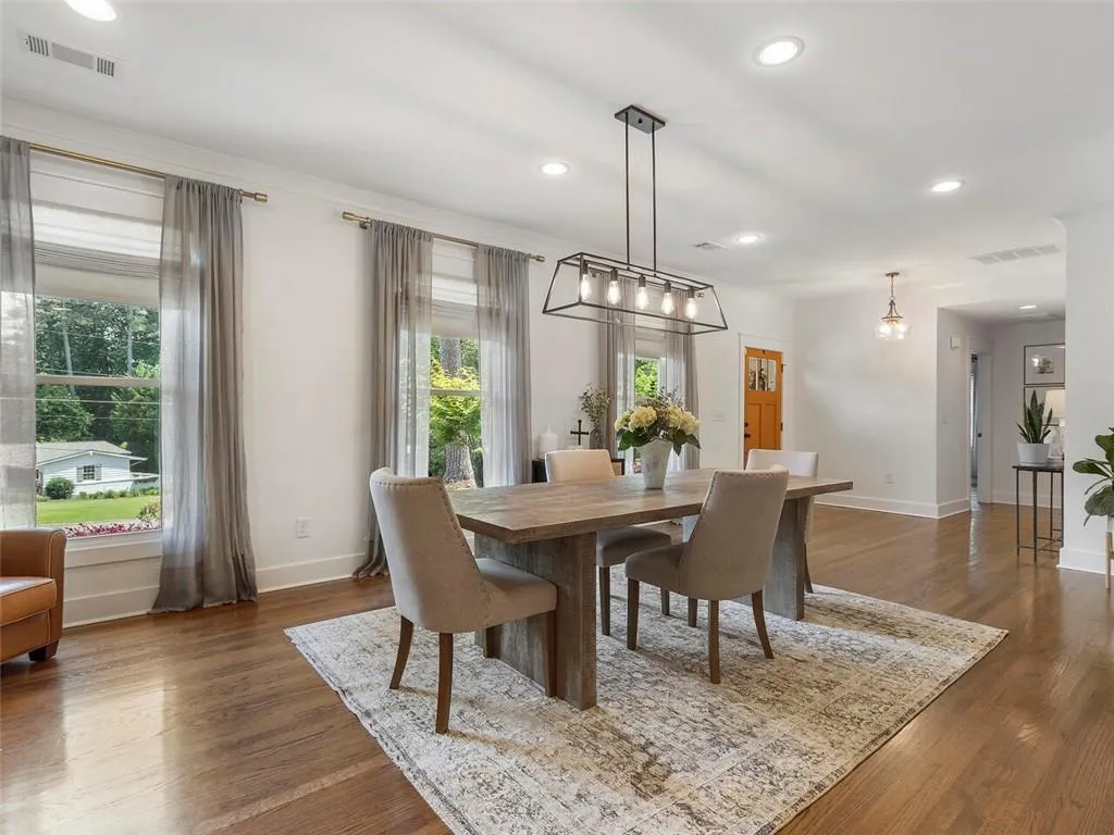 Dining area featuring dark hardwood / wood-style flooring