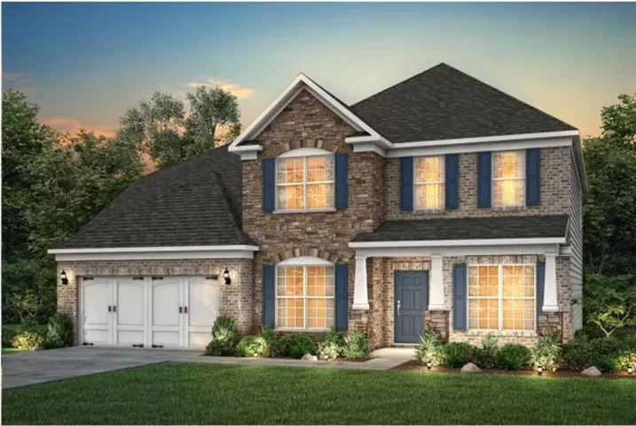 Stone and siding exterior with a two-car garage