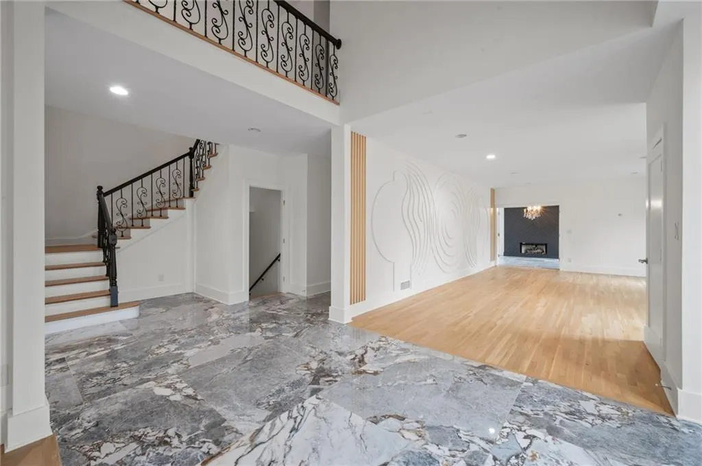 Unfurnished living room with wood-type flooring