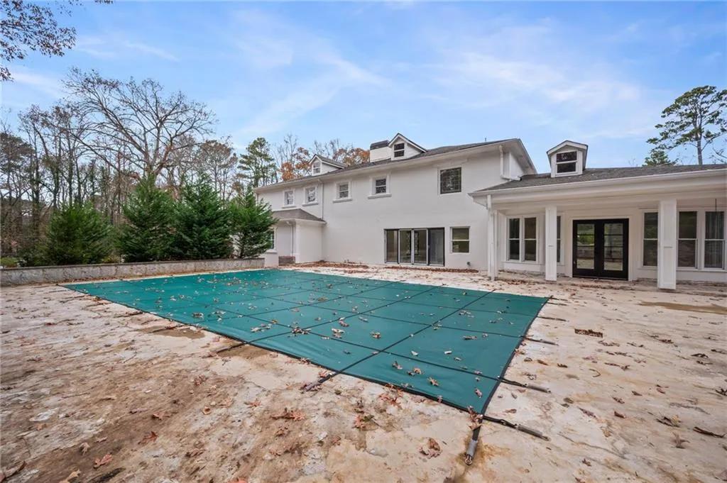 View of pool featuring a patio area and french doors