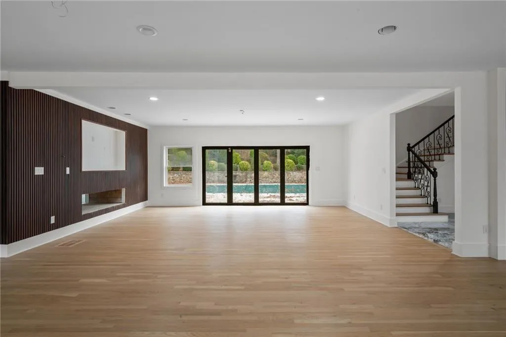 Unfurnished living room with light wood-type flooring