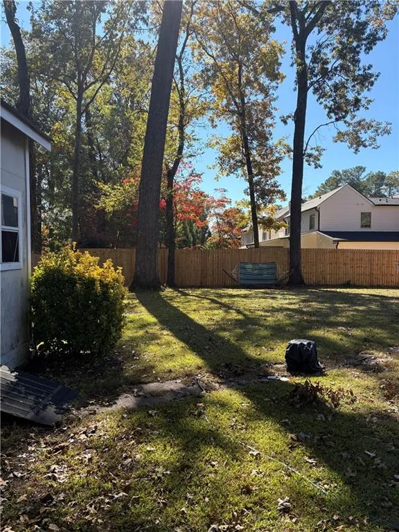 View of fenced backyard