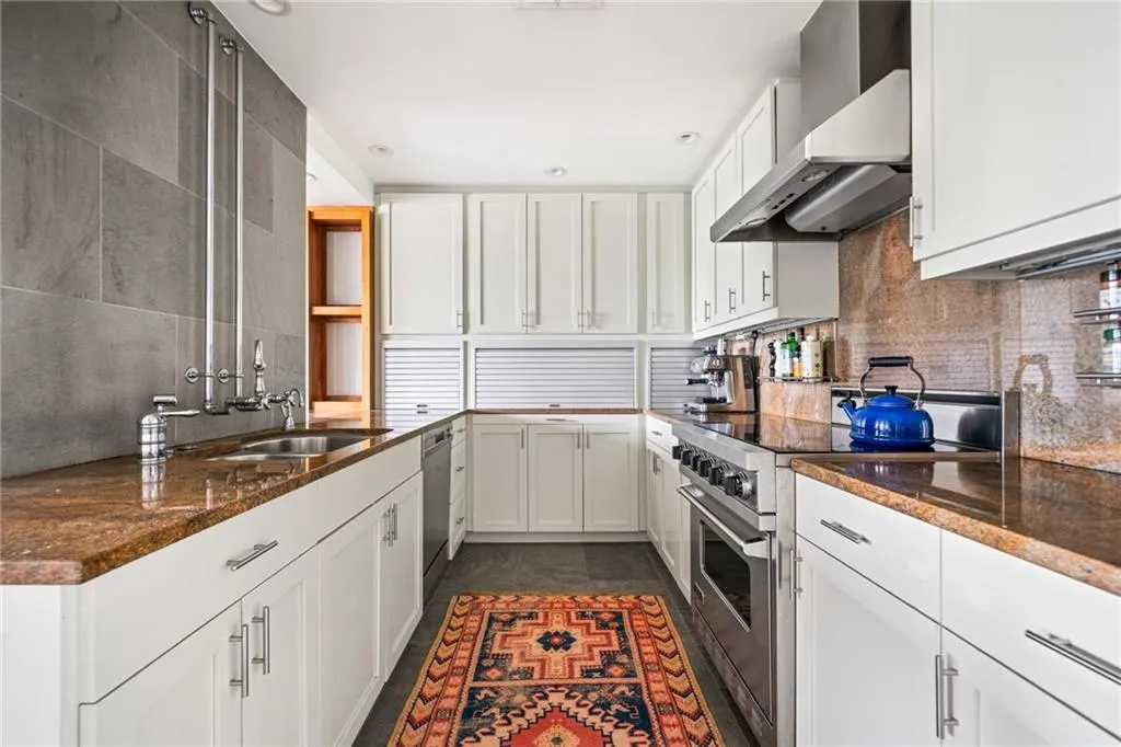 Kitchen is open to Dining and Living rooms