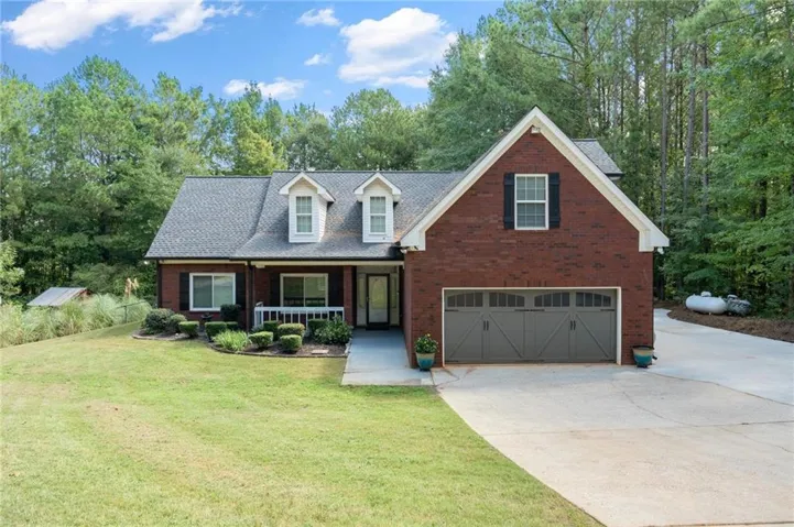 Red brick exterior with white trim