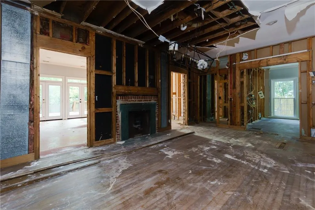 Unfurnished living room featuring a fireplace
