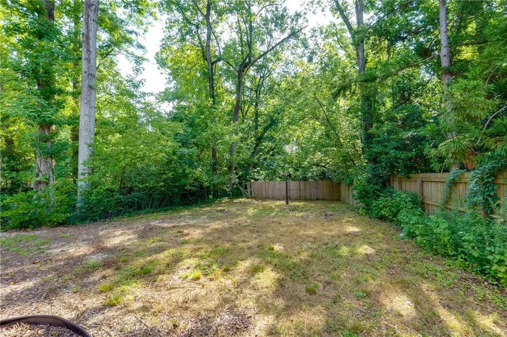 View of fenced backyard