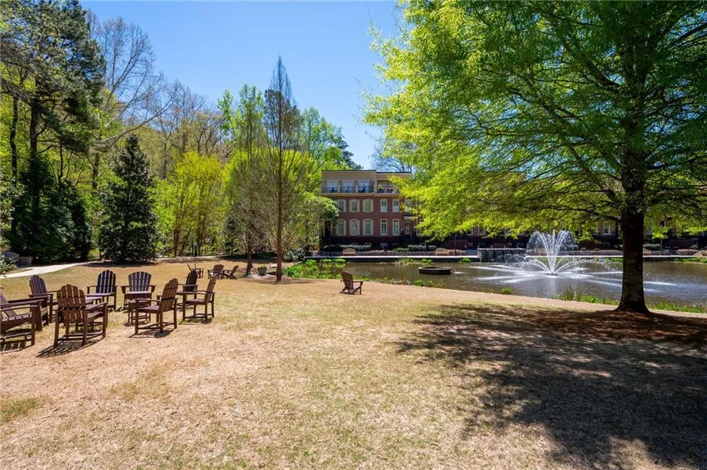 View of yard with a water view