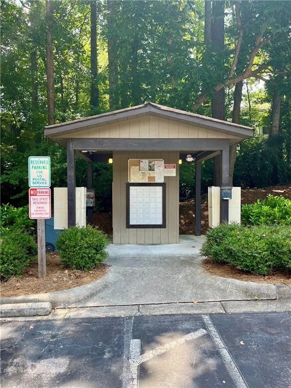 View of home's community featuring mail area