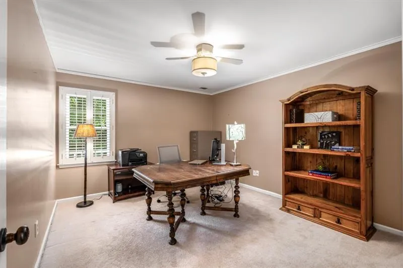 Upstairs secondary bedroom currently used as a home office.