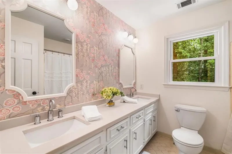 One of the 3 full upstairs bathrooms.