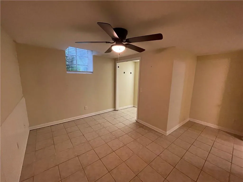 Terrace level Bedroom 1 - with ceiling fan and walk in closet