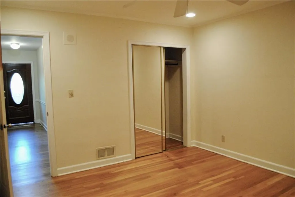 Bedroom 1  - Mirrored closet and interior entrance