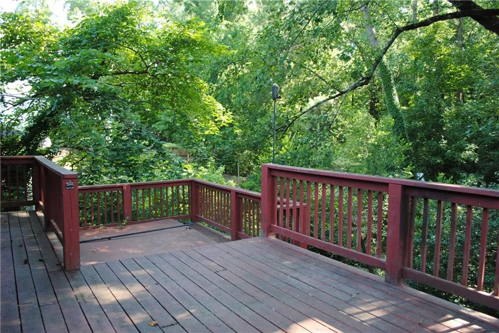 Shaded private backyard deck off family room