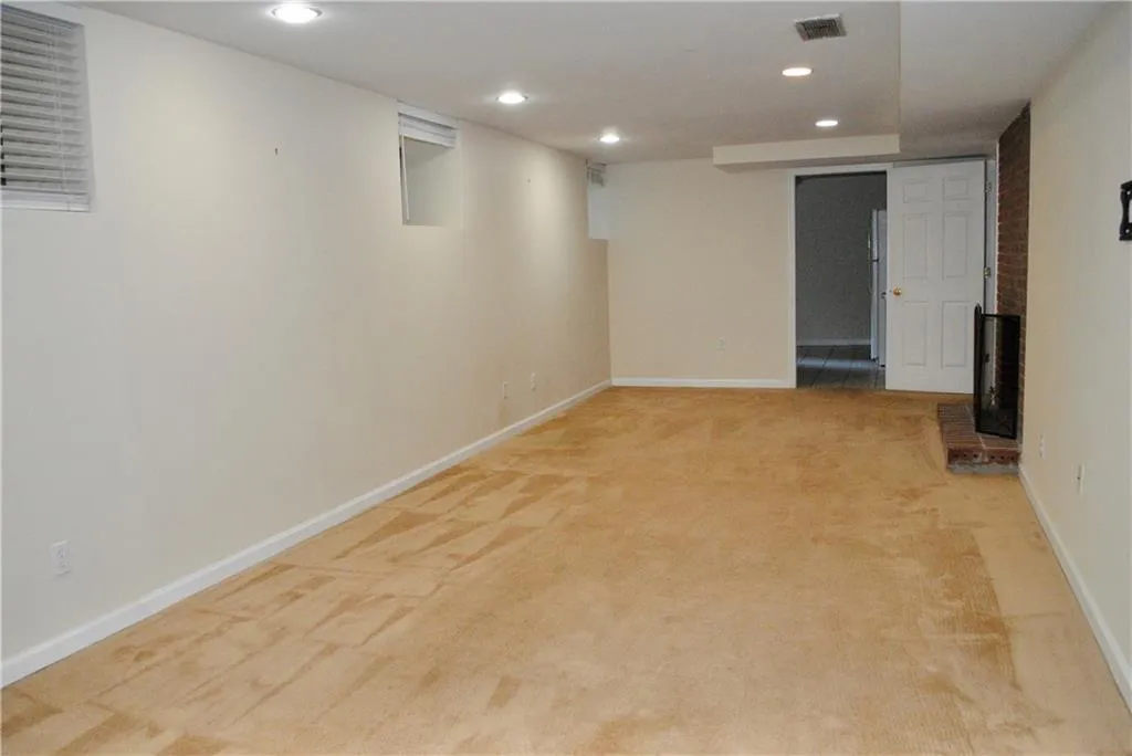 Terrace level play room - other angle. Kitchen straight ahead