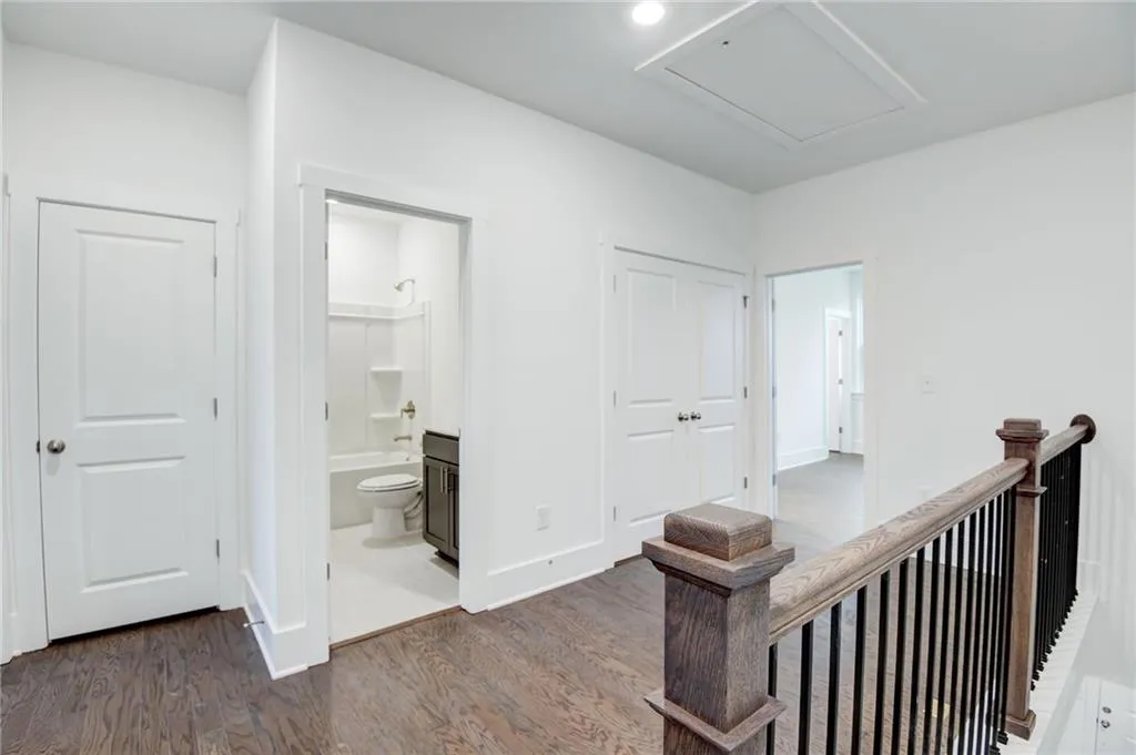 the loft area is between the bedrooms on the 2nd floor.  Photo example only not actual home.