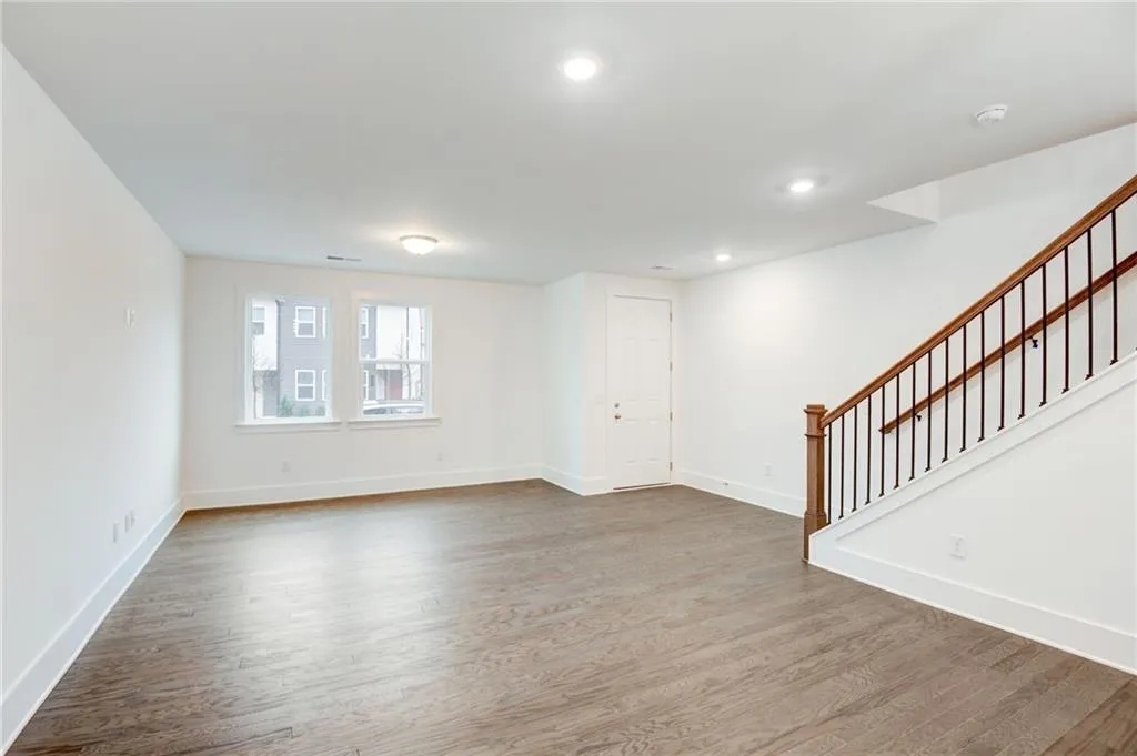 View from the dining area to the family room space. Photo example only not actual home.