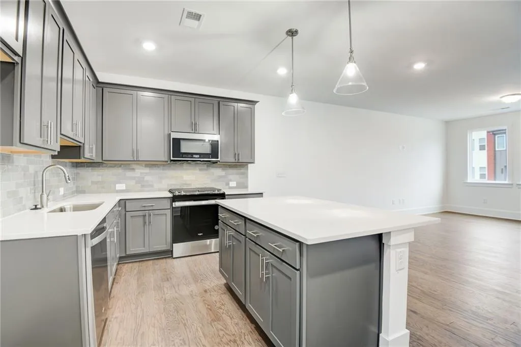 Easy prep with your center island and cabinets galore.  Photo example only not actual home.