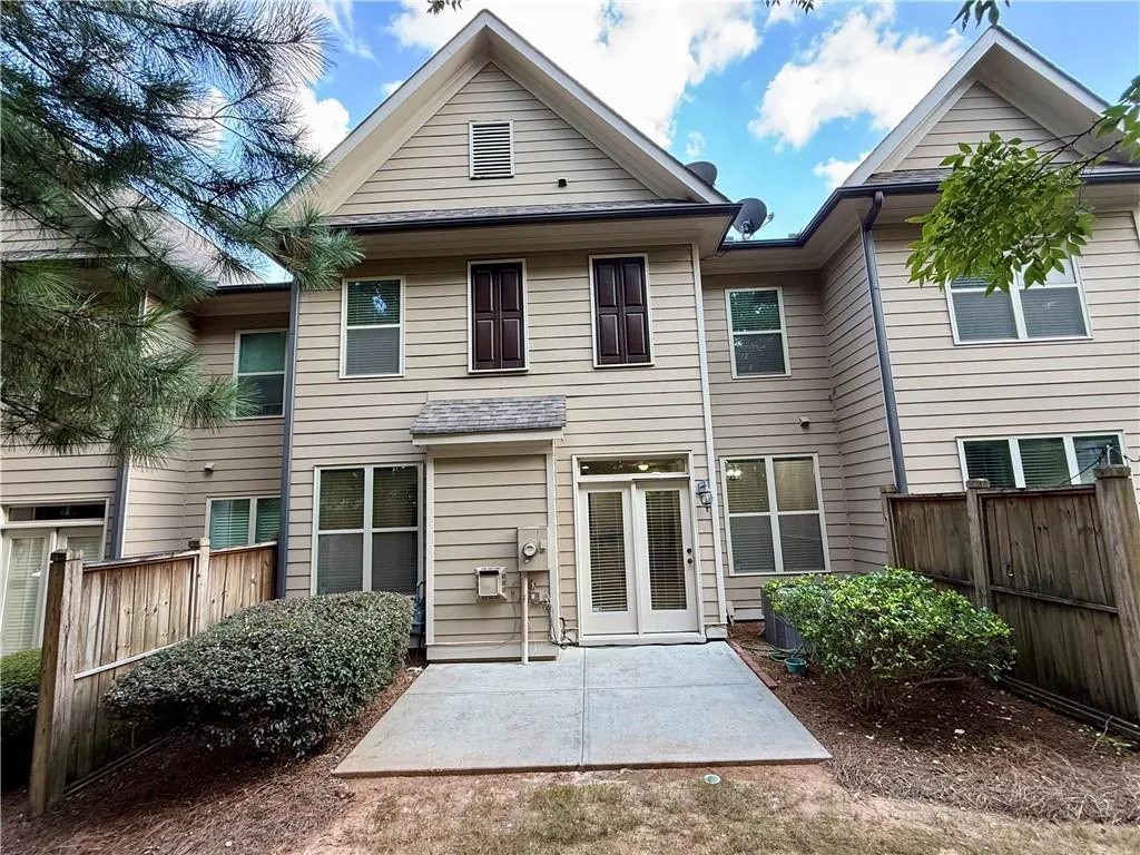 Back of property featuring a patio area