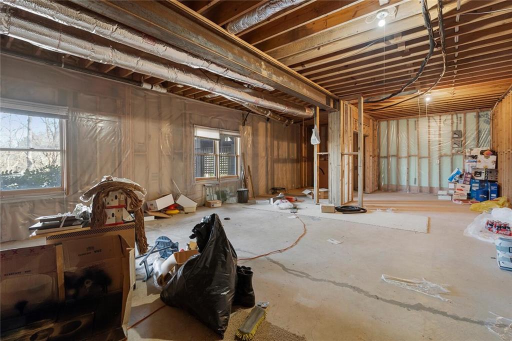 Basement featuring plenty of natural light