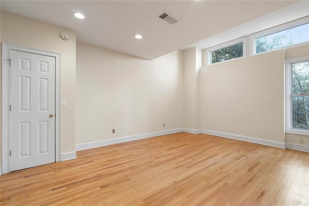 Spare room with light hardwood / wood-style floors