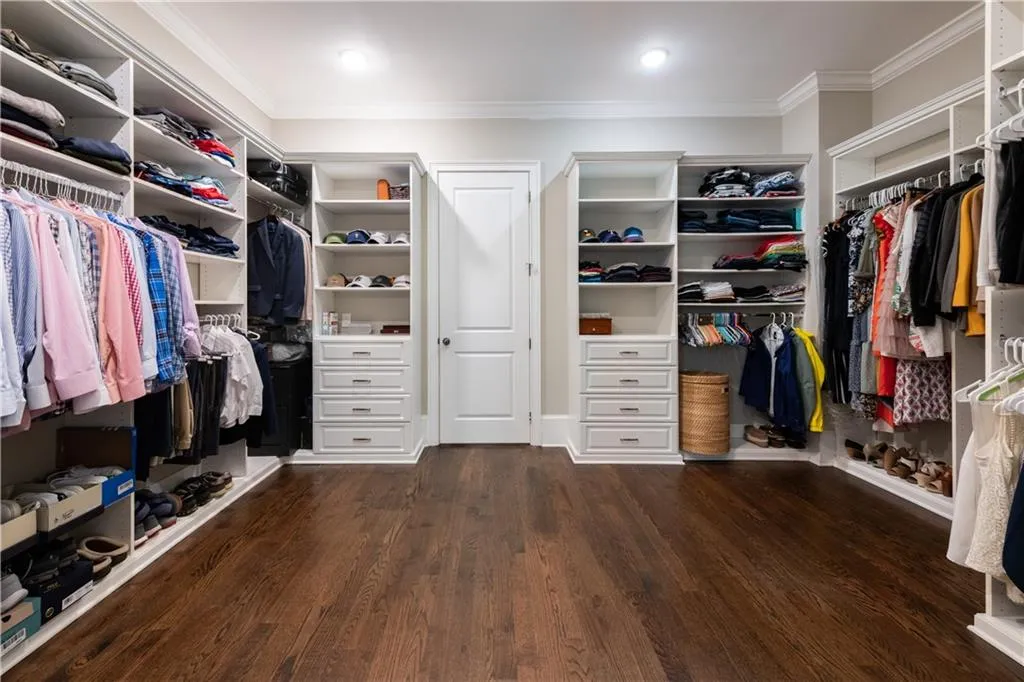 Primary Suite Closet Also Connects to Laundry Room