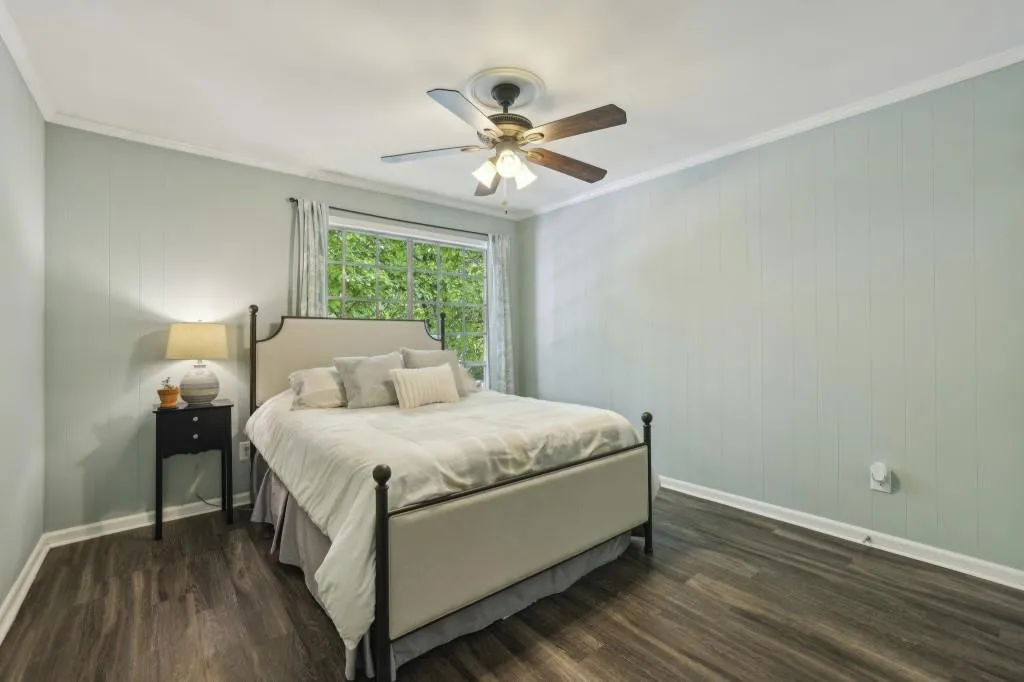 Primary Bedroom, complete with a Cozy Fireplace and Walk-In Closet