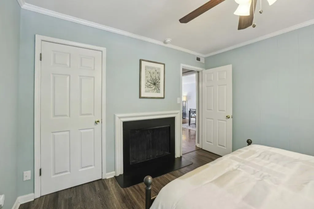 Retreat to the spacious Primary Bedroom, complete with a Cozy Fireplace and Walk-In Closet.