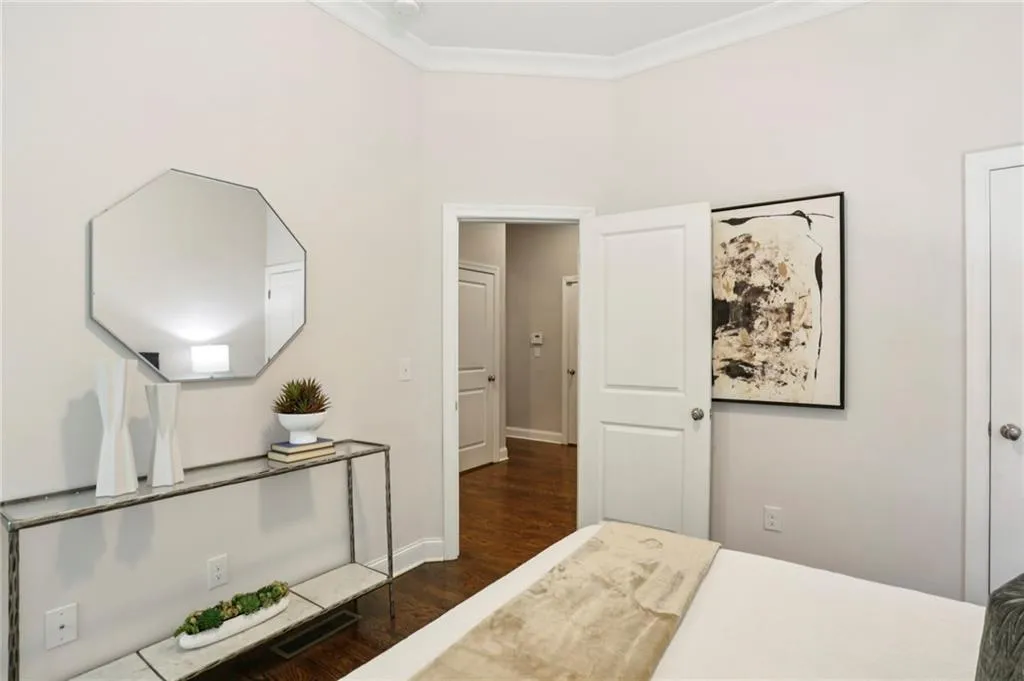 Bedroom#1 with hardood floors and ornamental molding