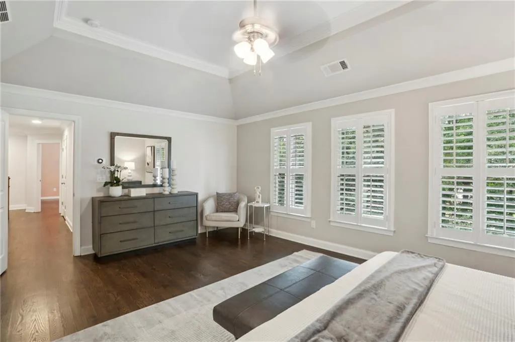 Spacious closet featuring dark wood finished floors
