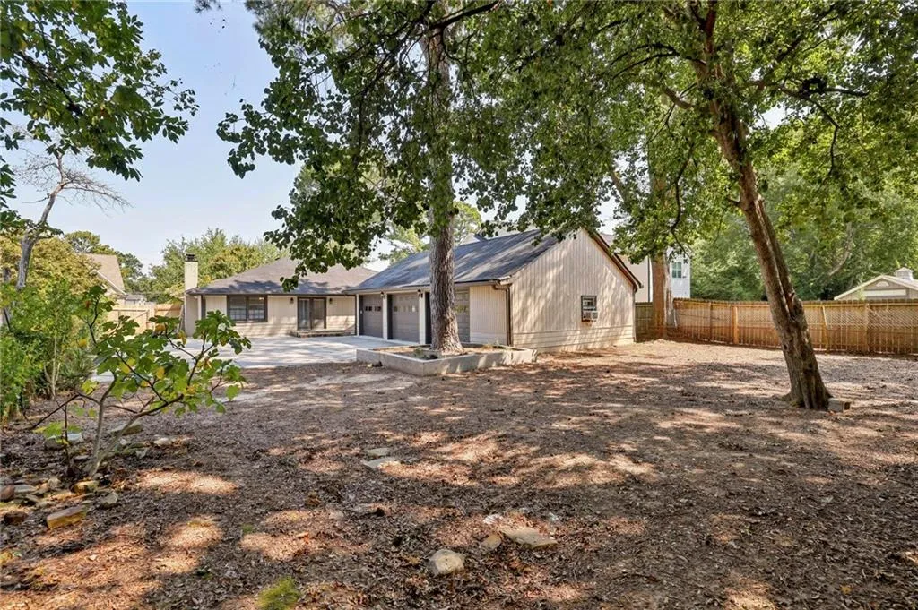 Rear view of house featuring a patio