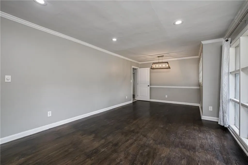 Large Living Room/Dining Room with recessed lighting and hardwood flooring