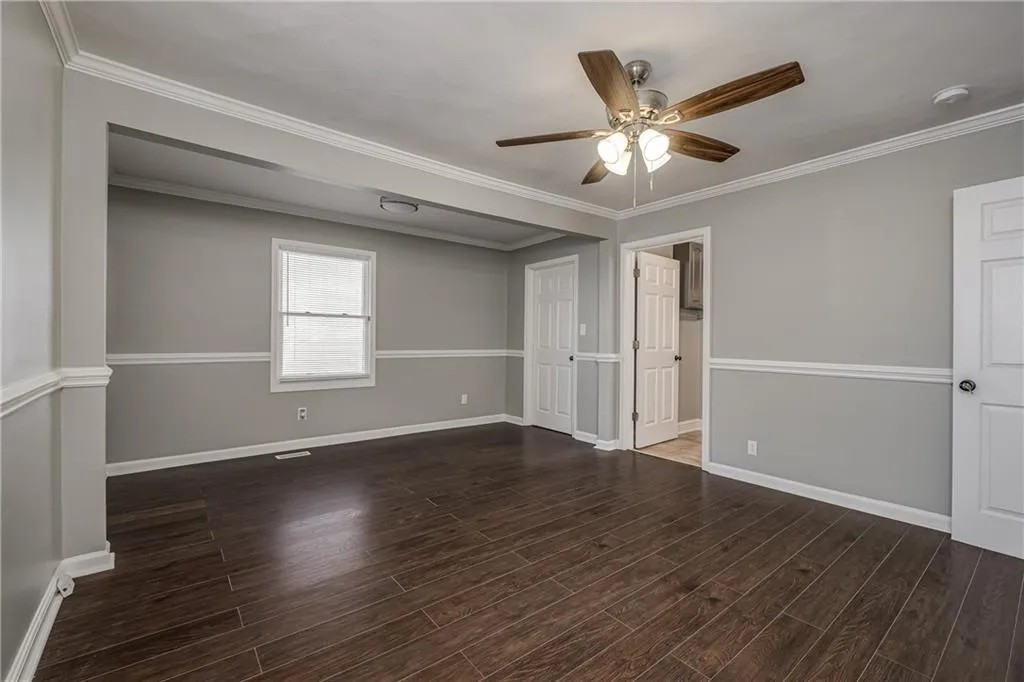 Large walk-in closet is located off of the sitting room area of the Primary Bedroom