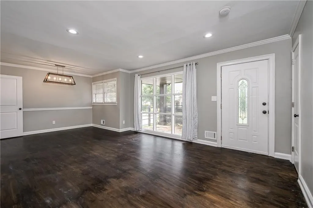 Front door opens to large Living Room/Dining Room. Huge picture window provides lots of natural light
