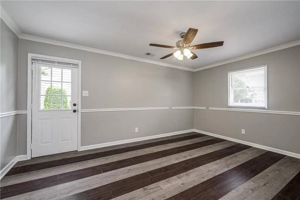 Bedroom #4 is located off the kitchen includes a separate private entrance
