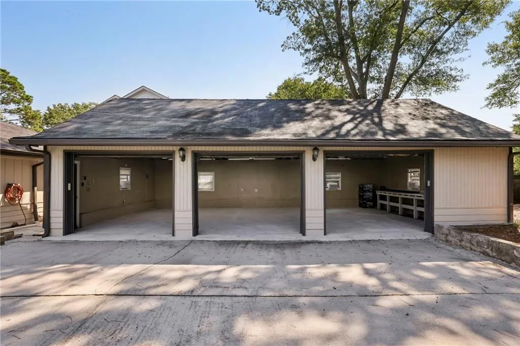 Garage with concrete driveway