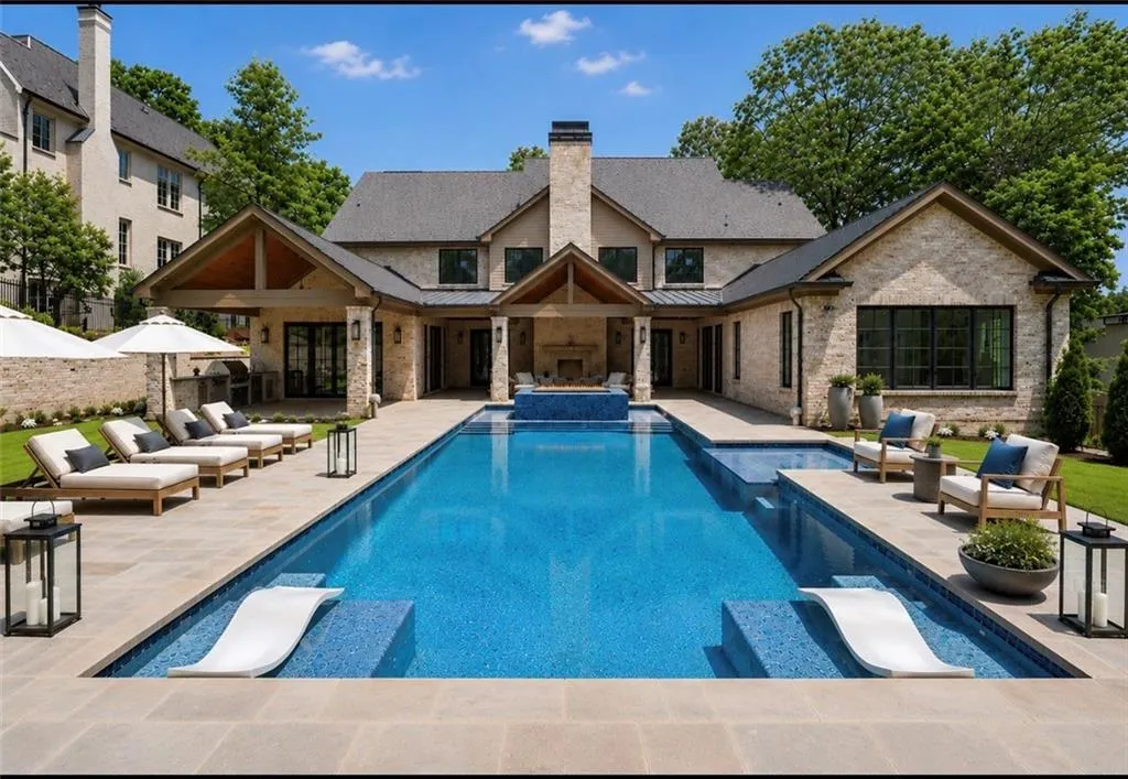 Outside Fireplace and large Pool.