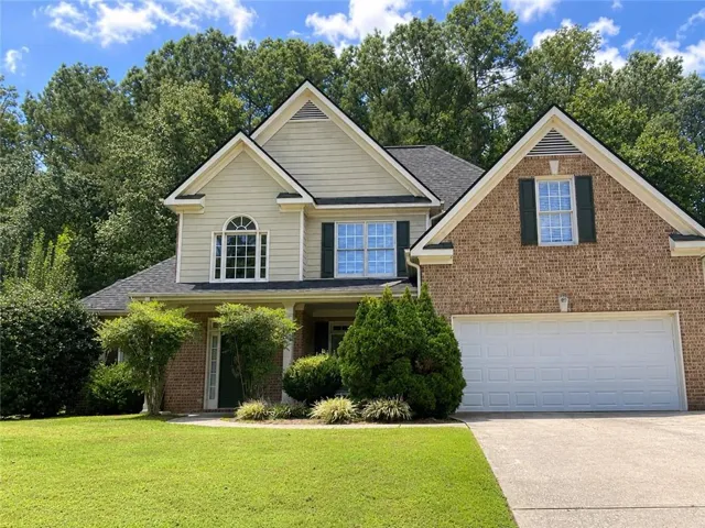 Brick and siding exterior with gabled roof lines