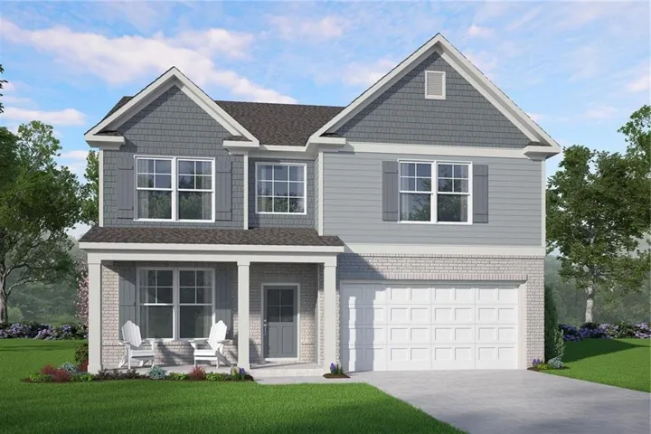 Two-story residence featuring a covered front porch, brick and siding exterior, multi-pane windows, and an attached two-car garage