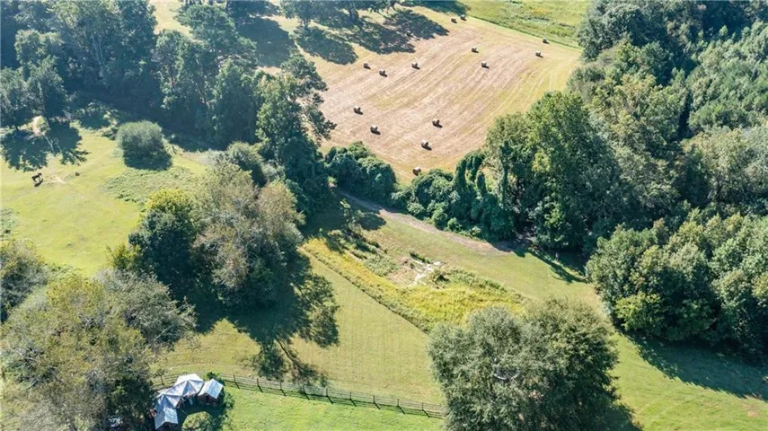 Aerial overview of property's location featuring rural landscape and a pastoral area