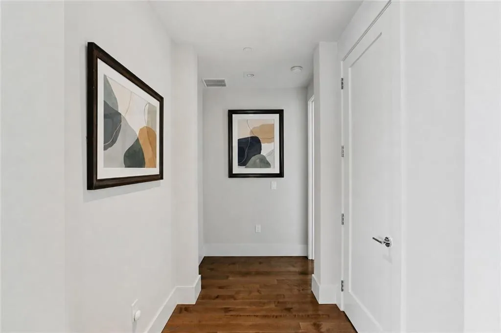 Hallway to private Primary bedroom