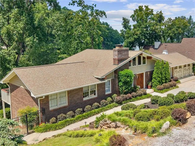 Beautifully landscaped front entry with a 2-car garage and plenty of parking in the driveway and on the street as well!
