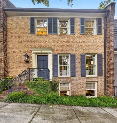 One of 4 coveted brick townhomes in Brookwood Hills