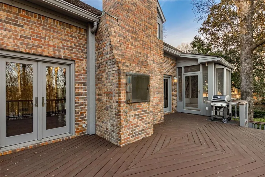 French doors lead to an area for grilling.